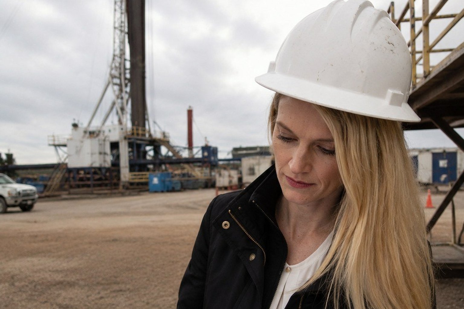 Amber Russell reviewing plans at a Central Texas industrial site